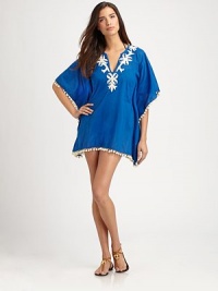 Contrasting embroidery and perky pom-poms give this coverup undeniable charm. V-neckDolman sleevesPull-on stylePom-pom detailsCottonHand washImported Contrasting embroidery and perky pom-poms give this coverup undeniable charm. V-neckDolman sleevesPull-on stylePom-pom detailsCottonHand washImported