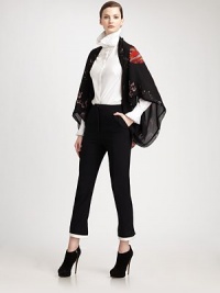 Impeccably tailored to fit the figure, this slim-fitting pair is accented with contrast dual-layered cuffs.Zip flySide slash pocketsDual-layered, vented cuffsBack waistband notchBack button welt pocketInseam, about 2750% rayon/50% acetateDry cleanMade in Italy of imported fabricModel shown is 5'10 (177cm) wearing US size 4. Impeccably tailored to fit the figure, this slim-fitting pair is accented with contrast dual-layered cuffs.Zip flySide slash pocketsDual-layered, vented cuffsBack waistband notchBack button welt pocketInseam, about 2750% rayon/50% acetateDry cleanMade in Italy of imported fabricModel shown is 5'10 (177cm) wearing US size 4.