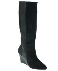 Cool combo. Paris Hilton's Kaori tall wedge boots feature a strip of leather that contrasts nicely against the suede shaft. Cool combo. Paris Hilton's Kaori tall wedge boots feature a strip of leather that contrasts nicely against the suede shaft.