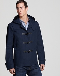 Furnished with a leather trim toggle front, deep hand pockets and pronounced shoulder panels, this handsome lightweight jacket offers a unique design with plenty of masculine appeal, a powerful yet accessible look from Elie Tahari. Furnished with a leather trim toggle front, deep hand pockets and pronounced shoulder panels, this handsome lightweight jacket offers a unique design with plenty of masculine appeal, a powerful yet accessible look from Elie Tahari.
