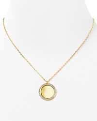 Plated in high-shine metal with a striking drop pendant, this Michael Kors necklace styles every look with effortless luxury. Plated in high-shine metal with a striking drop pendant, this Michael Kors necklace styles every look with effortless luxury.