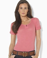 A modern twist on the classic Henley shirt, this stylish essential is crafted in soft waffle-knit slub cotton with chic roll-tab sleeves. A modern twist on the classic Henley shirt, this stylish essential is crafted in soft waffle-knit slub cotton with chic roll-tab sleeves.