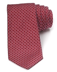 This plush silk tie balances a whimsical pattern of dots and circles with a traditional 3.5 width for a refined style that's perfect for the office or any of your dressed-up affairs. This plush silk tie balances a whimsical pattern of dots and circles with a traditional 3.5 width for a refined style that's perfect for the office or any of your dressed-up affairs.