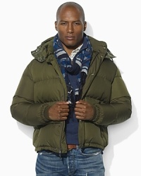 A must-have as the weather becomes brisk, this puffer jacket features a detachable hood for warmth and packs away into an interior pocket to make travel easier. A must-have as the weather becomes brisk, this puffer jacket features a detachable hood for warmth and packs away into an interior pocket to make travel easier.