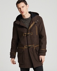 A warm, handsome coat protects you from the elements in bona fide style with this inspired look from MARC BY MARC JACOBS. A warm, handsome coat protects you from the elements in bona fide style with this inspired look from MARC BY MARC JACOBS.