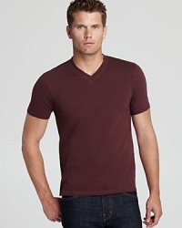 Garment dyed for a rich hue, this versatile V-neck brightens your day and pairs well with a variety of jeans, shorts and casual pants. Garment dyed for a rich hue, this versatile V-neck brightens your day and pairs well with a variety of jeans, shorts and casual pants.