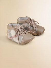 Soft-tone signature check design with supple leather trim for stylish first steps.Cotton and leather upper Lace-up closure Padded insole Leather sole Imported Soft-tone signature check design with supple leather trim for stylish first steps.Cotton and leather upper Lace-up closure Padded insole Leather sole Imported