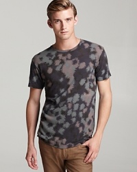 An inspired tee from MARC BY MARC JACOBS transforms military camouflage into an abstract pattern, redefining the urban warrior as a man of artful distinction. An inspired tee from MARC BY MARC JACOBS transforms military camouflage into an abstract pattern, redefining the urban warrior as a man of artful distinction.
