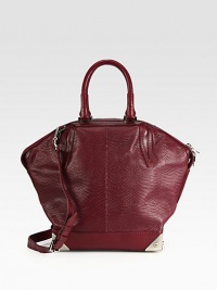 A roomy carryall in glossy snake embossed leather that expresses the brand's effortlessly cool style.Double top handles, 5½ dropDetachable adjustable shoulder strap, 14-17 dropTop zip closureProtective metal feetOne inside zip pocketTwo inside open pocketsFully lined16W X 10½H X 6DImported A roomy carryall in glossy snake embossed leather that expresses the brand's effortlessly cool style.Double top handles, 5½ dropDetachable adjustable shoulder strap, 14-17 dropTop zip closureProtective metal feetOne inside zip pocketTwo inside open pocketsFully lined16W X 10½H X 6DImported