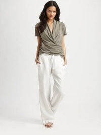 Whisperweight cotton knit, elegantly draped in a flattering cross-front style.Short sleevesDraped frontPullover styleAbout 18 from shoulder to hemCottonMachine washImportedModel shown is 5'11 (180cm) wearing US size X-Small. Whisperweight cotton knit, elegantly draped in a flattering cross-front style.Short sleevesDraped frontPullover styleAbout 18 from shoulder to hemCottonMachine washImportedModel shown is 5'11 (180cm) wearing US size X-Small.