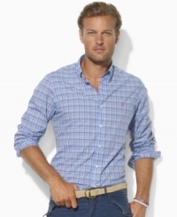 A handsome sport shirt is accented with Ralph Lauren's embroidered pony and tailored for a trim fit in plaid cotton broadcloth. A handsome sport shirt is accented with Ralph Lauren's embroidered pony and tailored for a trim fit in plaid cotton broadcloth.