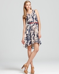 A graphic print emboldens this Max & Cleo dress, made complete with a vibrant, waist-cinching belt for an unexpected pop of color. A graphic print emboldens this Max & Cleo dress, made complete with a vibrant, waist-cinching belt for an unexpected pop of color.
