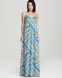 The vivid zigzag print on this day-perfect Aqua maxi imbues your wardrobe with a kaleidoscope of color--trend-right for spring and simply delightful for a day spent lunching with friends. The vivid zigzag print on this day-perfect Aqua maxi imbues your wardrobe with a kaleidoscope of color--trend-right for spring and simply delightful for a day spent lunching with friends.