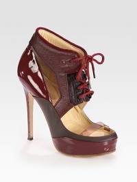 Glossy patent, two-tone leather and soft calf hair combine in this lace-up silhouette, finished with suede trim. Patent leather-covered heel, 5¼ (130mm)Hidden patent leather platform, 1½ (40mm)Compares to a 3¾ heel (95mm)Patent leather, PVC, leather and calf hair upper with suede trimLeather lining and solePadded insoleMade in Italy Glossy patent, two-tone leather and soft calf hair combine in this lace-up silhouette, finished with suede trim. Patent leather-covered heel, 5¼ (130mm)Hidden patent leather platform, 1½ (40mm)Compares to a 3¾ heel (95mm)Patent leather, PVC, leather and calf hair upper with suede trimLeather lining and solePadded insoleMade in Italy
