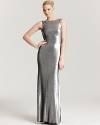 Turn around in this showstopping ABS by Allen Schwartz sequin gown to reveal an elegantly draped back.