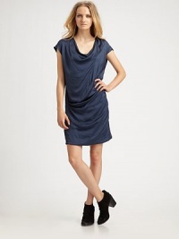 Simply luxurious, this gathered sateen shift drapes beautifully over the body.CowlneckDropped shouldersShort sleevesRuching at hipsAbout 17 from natural waist83% polyester/17% nylonDry cleanMade in USA of imported fabricModel shown is 5'9 (175cm) wearing US size 4. Simply luxurious, this gathered sateen shift drapes beautifully over the body.CowlneckDropped shouldersShort sleevesRuching at hipsAbout 17 from natural waist83% polyester/17% nylonDry cleanMade in USA of imported fabricModel shown is 5'9 (175cm) wearing US size 4.
