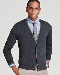 A double layer at the placket provides contrast, giving this handsome and thoroughly soft merino wool cardigan an extra dose of personality. A double layer at the placket provides contrast, giving this handsome and thoroughly soft merino wool cardigan an extra dose of personality.