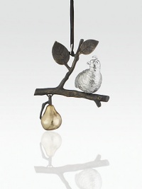 A silvery partridge perches on a delicate branch and gazes at a golden pear in a charming illustration of this beloved holiday setting.HandmadeSilverplated, goldplated and oxidizedAbout 5.5H X 4.25W X 1.75DImported A silvery partridge perches on a delicate branch and gazes at a golden pear in a charming illustration of this beloved holiday setting.HandmadeSilverplated, goldplated and oxidizedAbout 5.5H X 4.25W X 1.75DImported