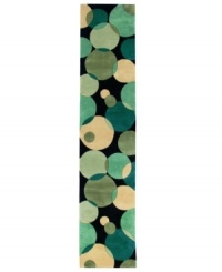 A runner to add a sleek look to any hallway. Abstract and absorbing, this rug features a multi-circle pattern in gray, taupe and an array of blues. Reminiscent of modern art paintings, it adds striking modernity and grace to your home. Hand-tufted and hand-carved of plush wool. A runner to add a sleek look to any hallway. Abstract and absorbing, this rug features a multi-circle pattern in gray, taupe and an array of blues. Reminiscent of modern art paintings, it adds striking modernity and grace to your home. Hand-tufted and hand-carved of plush wool.