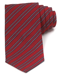A traditionally striped tie in pure Italian silk lends luxury to your polished wardrobe and can be worn to work or your dressed-up evening affairs. A traditionally striped tie in pure Italian silk lends luxury to your polished wardrobe and can be worn to work or your dressed-up evening affairs.