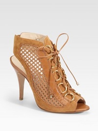 This breezy leather and suede cutout style with D-ring buckles, leather laces and a flirty peep-toe, captures feminine confidence.Self-covered heel 4 (100mm) Peep-toe D-ring buckles with leather lace-up Elastic back insert Leather lining and sole Padded insole Made in Italy This breezy leather and suede cutout style with D-ring buckles, leather laces and a flirty peep-toe, captures feminine confidence.Self-covered heel 4 (100mm) Peep-toe D-ring buckles with leather lace-up Elastic back insert Leather lining and sole Padded insole Made in Italy