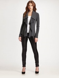 Boxy, open-front topper has cascading ruffles and a jacket-like form. Open ruffle frontLong sleeves68% cotton/32% polyesterDry cleanImportedModel shown is 5'10 (177cm) wearing US size Small. Boxy, open-front topper has cascading ruffles and a jacket-like form. Open ruffle frontLong sleeves68% cotton/32% polyesterDry cleanImportedModel shown is 5'10 (177cm) wearing US size Small.