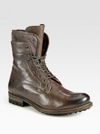 A sleek take on the rugged lace-up style, finished with an easy side zipper and soft shearling lining.Lace-up frontSide zipperLeather upperShearling liningRubber soleMade in Italy A sleek take on the rugged lace-up style, finished with an easy side zipper and soft shearling lining.Lace-up frontSide zipperLeather upperShearling liningRubber soleMade in Italy