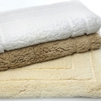 Ultra-soft underfoot, these Abyss Caress bath rugs are 100 percent cotton.