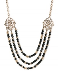 Good things come in threes as seen by this necklace from Lucky Brand. Crafted from gold-tone mixed metal, the collar features three rows of semi-precious onyx stones and glistening glass accents. Approximate length: 20 inches + 2-inch extender. Approximate drop: 1-3/4 inches.