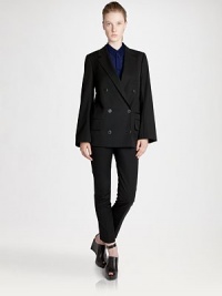 This double-breasted, menswear-inspired style is tailored with wide sleeves and a boxy silhouette.Notched lapelsBreast welt pocketDouble-breasted button frontSide welt pocketsSide flap pocketsWoolDry cleanMade in ItalyModel shown is 5'10 (177cm) wearing US size 4. This double-breasted, menswear-inspired style is tailored with wide sleeves and a boxy silhouette.Notched lapelsBreast welt pocketDouble-breasted button frontSide welt pocketsSide flap pocketsWoolDry cleanMade in ItalyModel shown is 5'10 (177cm) wearing US size 4.