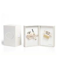 A fresh and feminine fragrance with an utterly innate sense of chic. This gift set includes a 1.7 oz. Eau de Parfum Spray, a 3.4 oz. Body Lotion, and a .20 oz. Rollerball Eau de Parfum. A fresh and feminine fragrance with an utterly innate sense of chic. This gift set includes a 1.7 oz. Eau de Parfum Spray, a 3.4 oz. Body Lotion, and a .20 oz. Rollerball Eau de Parfum.