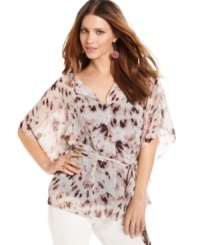 With an allover abstract print, this floaty RACHEL Rachel Roy blouse makes its mark as a fashion-forward topper! With an allover abstract print, this floaty RACHEL Rachel Roy blouse makes its mark as a fashion-forward topper!