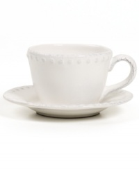 Elegant is an understatement with the Blanc Brigette cup and saucer by Versailles Maison. Raised dots and a soft white finish adorn classic silhouettes in beautifully distressed earthenware.