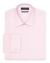 With subtle, very fine stripes, this quality button-down rewards its wearer with a soft drape and a measured, classic tone. Featuring French cuffs for a time-honored, professional look.