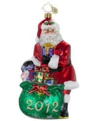 Wrap up the year with good cheer. Santa stuffs a few extra packages in his gift bag, made special for the 2012 holiday in mouth-blown glass by Christopher Radko. Wrap up the year with good cheer. Santa stuffs a few extra packages in his gift bag, made special for the 2012 holiday in mouth-blown glass by Christopher Radko.