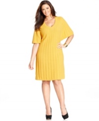 Look chic in cooler temps with Style&co.'s butterfly sleeve plus size sweater dress, crafted from a cable knit.