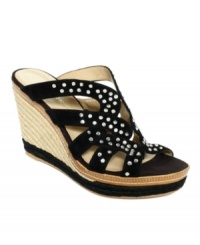 Sparkle away. The strappy vamp of Bandolino's Kasbar platform wedge sandals is decorated with a cute array of dazzling rhinestones. Sparkle away. The strappy vamp of Bandolino's Kasbar platform wedge sandals is decorated with a cute array of dazzling rhinestones.