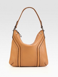 Impeccably tailored of luxe pebble-grain leather, this slouchy go-to shape is a timeless favorite. Top handle, 8 dropTop zip closureBack open pocketOne inside zip pocketTwo inside open pocketsSatin lining13½W X 12½H X 2DImported Impeccably tailored of luxe pebble-grain leather, this slouchy go-to shape is a timeless favorite. Top handle, 8 dropTop zip closureBack open pocketOne inside zip pocketTwo inside open pocketsSatin lining13½W X 12½H X 2DImported