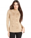 This petite turtleneck sweater features a flattering fit and fabulous ruching at the front!