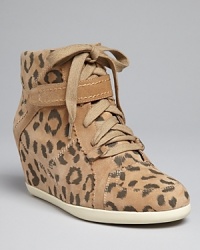 These Rebecca Taylor high top sneaker wedges are oh-so stylish; they add a little height to your standby weekend look. These Rebecca Taylor high top sneaker wedges are oh-so stylish; they add a little height to your standby weekend look.