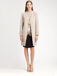 This soft felted design features belted cuffs and a matching sash belt.Stand collarConcealed button frontSelf slash beltSide pocketsBelted cuffsFully linedAbout 32 from shoulder to hemWool/angora/cashmereDry cleanMade in Italy of imported fabricModel shown is 5'10 (177cm) wearing US size 4. This soft felted design features belted cuffs and a matching sash belt.Stand collarConcealed button frontSelf slash beltSide pocketsBelted cuffsFully linedAbout 32 from shoulder to hemWool/angora/cashmereDry cleanMade in Italy of imported fabricModel shown is 5'10 (177cm) wearing US size 4.