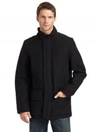 THE LOOKStand collar with concealed, zip-in hoodThroat tabZip front with snap storm flapDrawcord waistSlash pockets at chest; flap patch pockets at waistSnap cuffsVented back hemTHE FITAbout 28 from shoulder to hemTHE MATERIALShell: 50% polyester/43% cotton/7% nylonFill: polyesterFully linedCARE & ORIGINDry clean Imported THE LOOKStand collar with concealed, zip-in hoodThroat tabZip front with snap storm flapDrawcord waistSlash pockets at chest; flap patch pockets at waistSnap cuffsVented back hemTHE FITAbout 28 from shoulder to hemTHE MATERIALShell: 50% polyester/43% cotton/7% nylonFill: polyesterFully linedCARE & ORIGINDry clean Imported