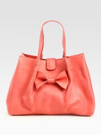 A simple stash-it-all essential, crafted from supple leather and finished with a demure front bow.Shoulder straps, 6½ dropTop snap closureOne inside zip pocketCotton lining13W X 14¼H X 4½DMade in Italy A simple stash-it-all essential, crafted from supple leather and finished with a demure front bow.Shoulder straps, 6½ dropTop snap closureOne inside zip pocketCotton lining13W X 14¼H X 4½DMade in Italy