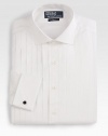 A luxurious, trim-fitting dress shirt is tailored in exquisite 120s-quality two-ply cotton poplin and finished with pintucks at the bib. Buttonfront Moderate spread collar Embroidered logo detail French cuffs Cotton Machine wash Imported 