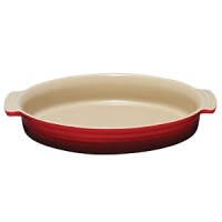 Ideal for baking, roasting, casseroles and more, Le Creuset's stoneware oval dish pairs distinctive design with multipurpose functionality. Oven, broiler and microwave friendly, it will not absorb odors or flavors. Ideal for baking, roasting, casseroles and more, Le Creuset's stoneware oval dish pairs distinctive design with multipurpose functionality. Oven, broiler and microwave friendly, it will not absorb odors or flavors.