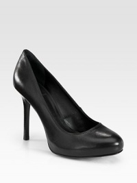 A wardrobe essential of sumptuous leather with a powerful stacked heel. Stacked heel, 4 (100mm)Leather upperLeather lining and solePadded insoleImported A wardrobe essential of sumptuous leather with a powerful stacked heel. Stacked heel, 4 (100mm)Leather upperLeather lining and solePadded insoleImported