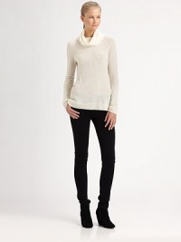 A slouchy turtleneck style crafted from extra-fine cashmere knit.Draped turtleneckRaglan sleevesRibbed trimPullover styleAbout 26 from shoulder to hemCashmereDry cleanImportedModel shown is 5'11 (180cm) wearing US size Small.This style runs true to size. We recommend ordering your usual size for a standard fit. A slouchy turtleneck style crafted from extra-fine cashmere knit.Draped turtleneckRaglan sleevesRibbed trimPullover styleAbout 26 from shoulder to hemCashmereDry cleanImportedModel shown is 5'11 (180cm) wearing US size Small.This style runs true to size. We recommend ordering your usual size for a standard fit.