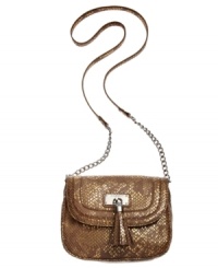 Opt for something wild in your everyday accessorizing with this shimmery, metallic crossbody from Nine West. Faux python-embossed leather is outfitted in shiny silver-tone hardware and flirty tassel accents, while the interior easily fits phone, wallet and makeup case.