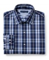 Get checked into bold style with the large plaid on this slim-fit dress shirt from Tommy Hilfiger..