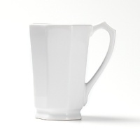 With a sleekly pointed handle and faceted sides, this stoneware mug from Billy Cotton infuses your tea or coffee with imperial elegance. With a sleekly pointed handle and faceted sides, this stoneware mug from Billy Cotton infuses your tea or coffee with imperial elegance.